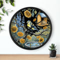 Round black decorative wall clock with a bird and nature design on a white background