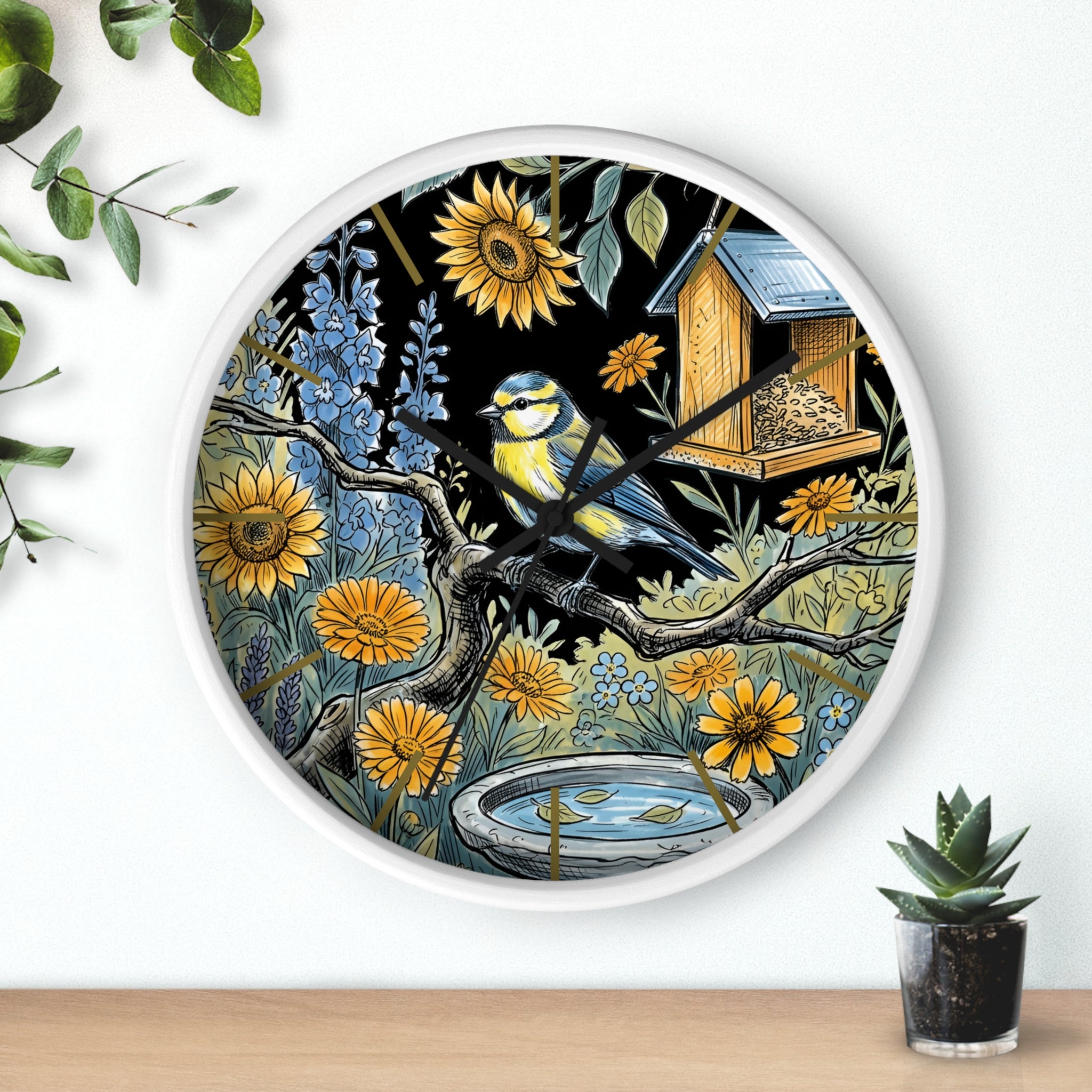 Round white decorative wall clock with black hands and a bird and floral design on a white background