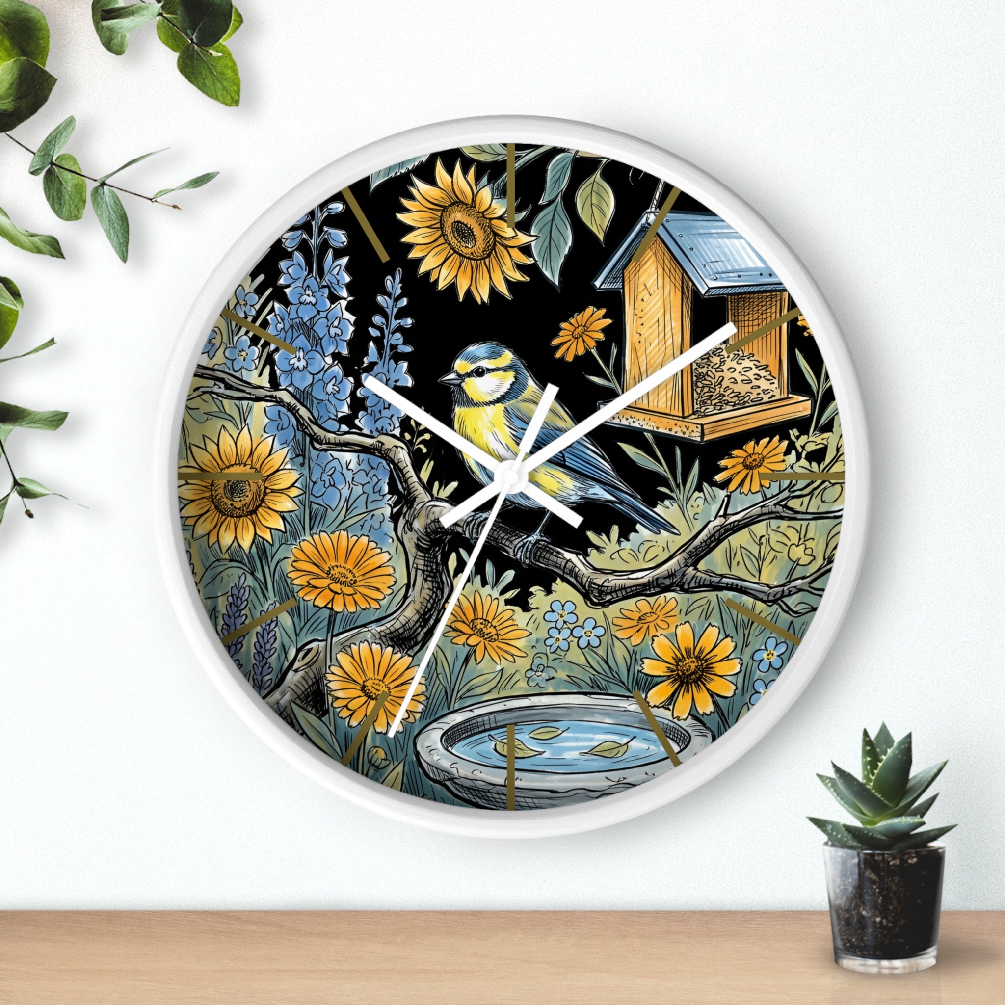 Decorative round white wall clock with nature-themed design featuring a bird, flowers, and a birdhouse.