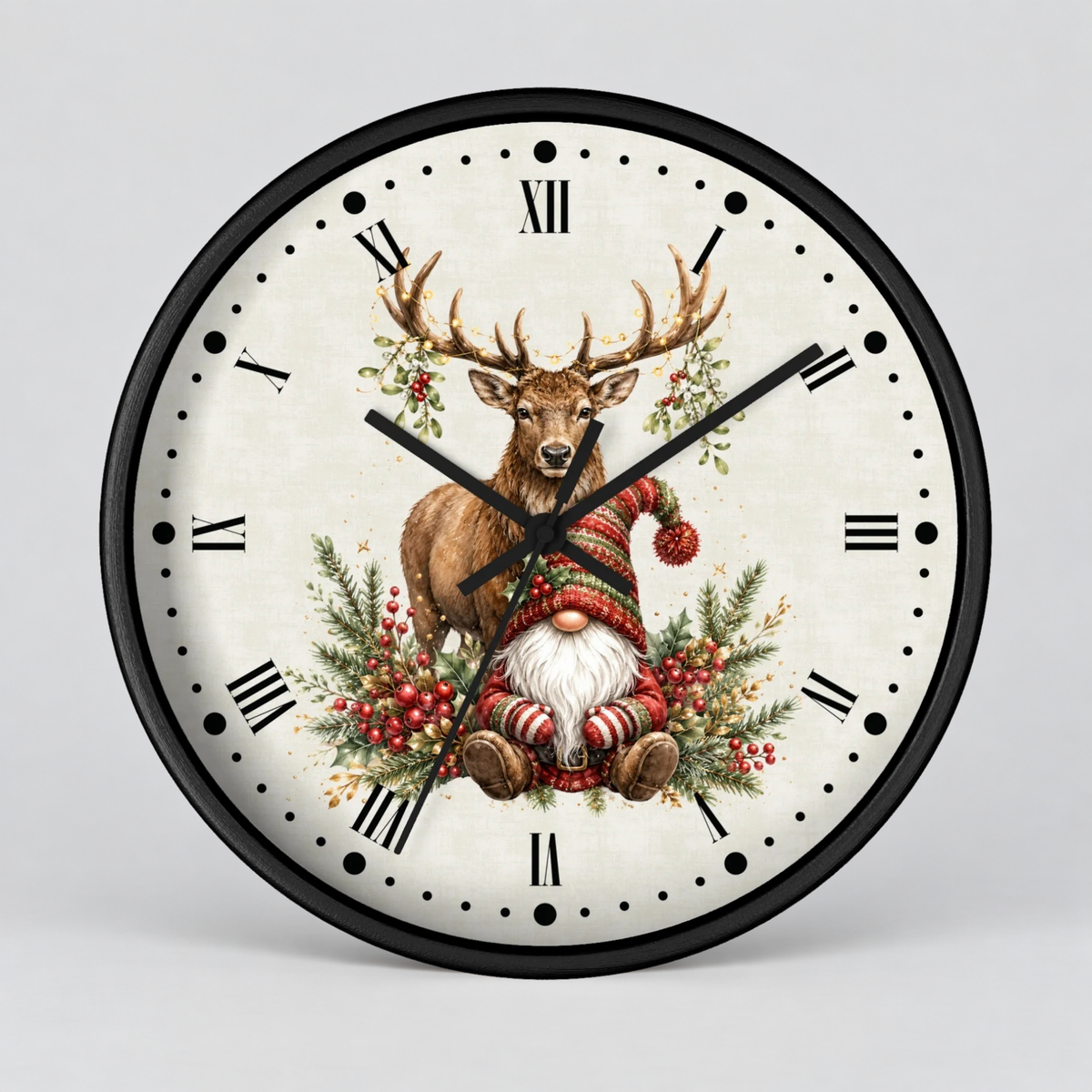 A round wall clock with a black frame and Roman numerals, featuring a festive illustration of a stag and a Christmas gnome surrounded by greenery and red berries on the clock face, shown against a light gray background.