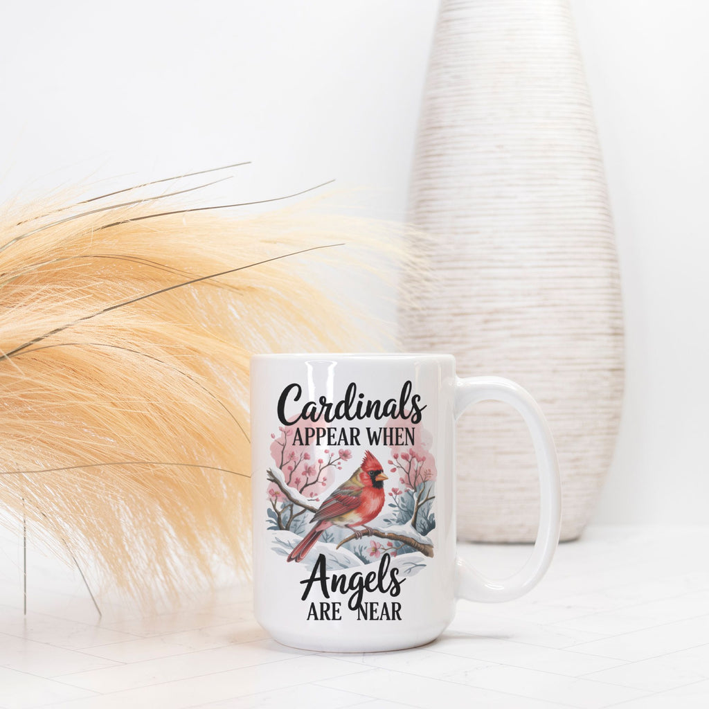 White mug with cardinal design and text on a white background