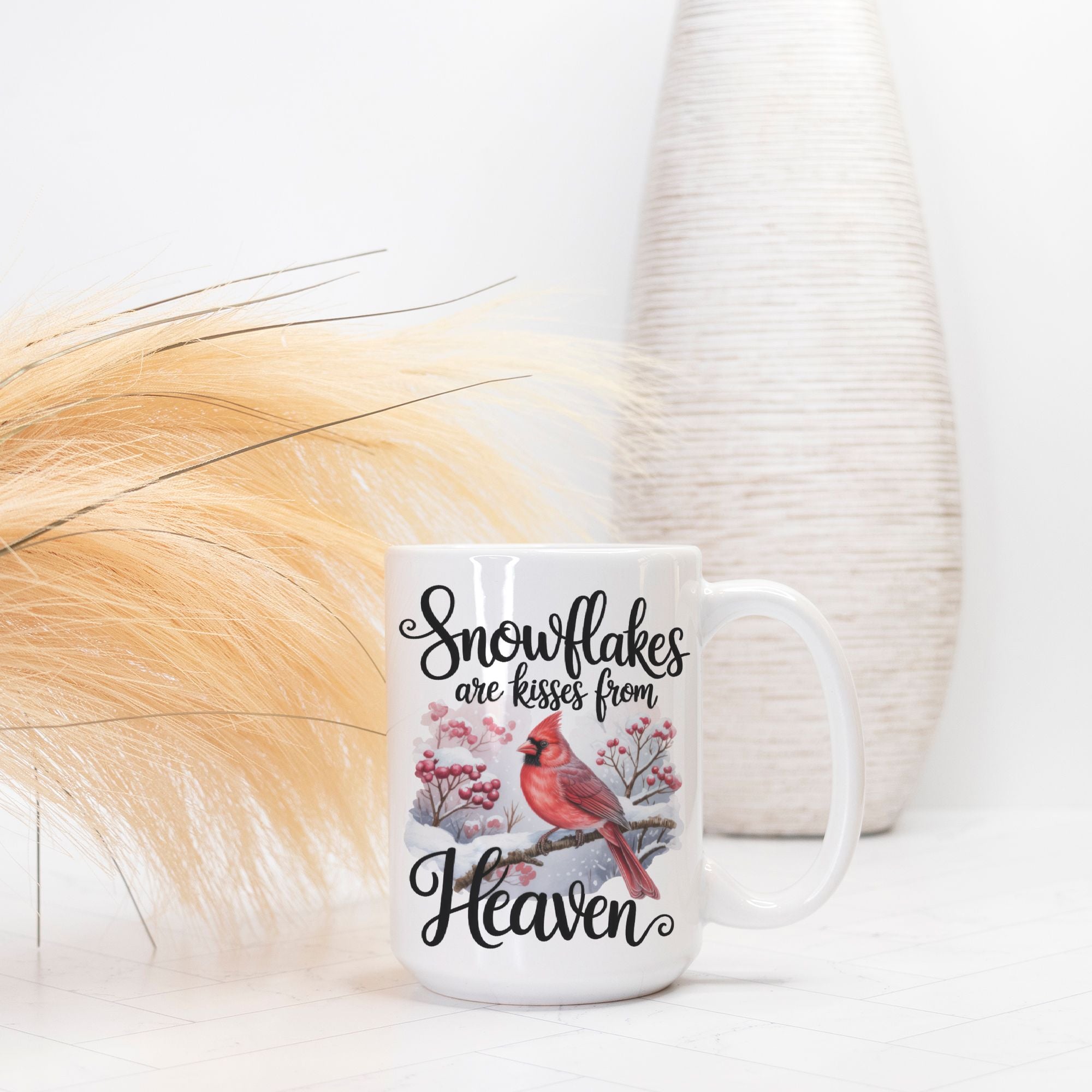 White mug with a cardinal design and text on a white background