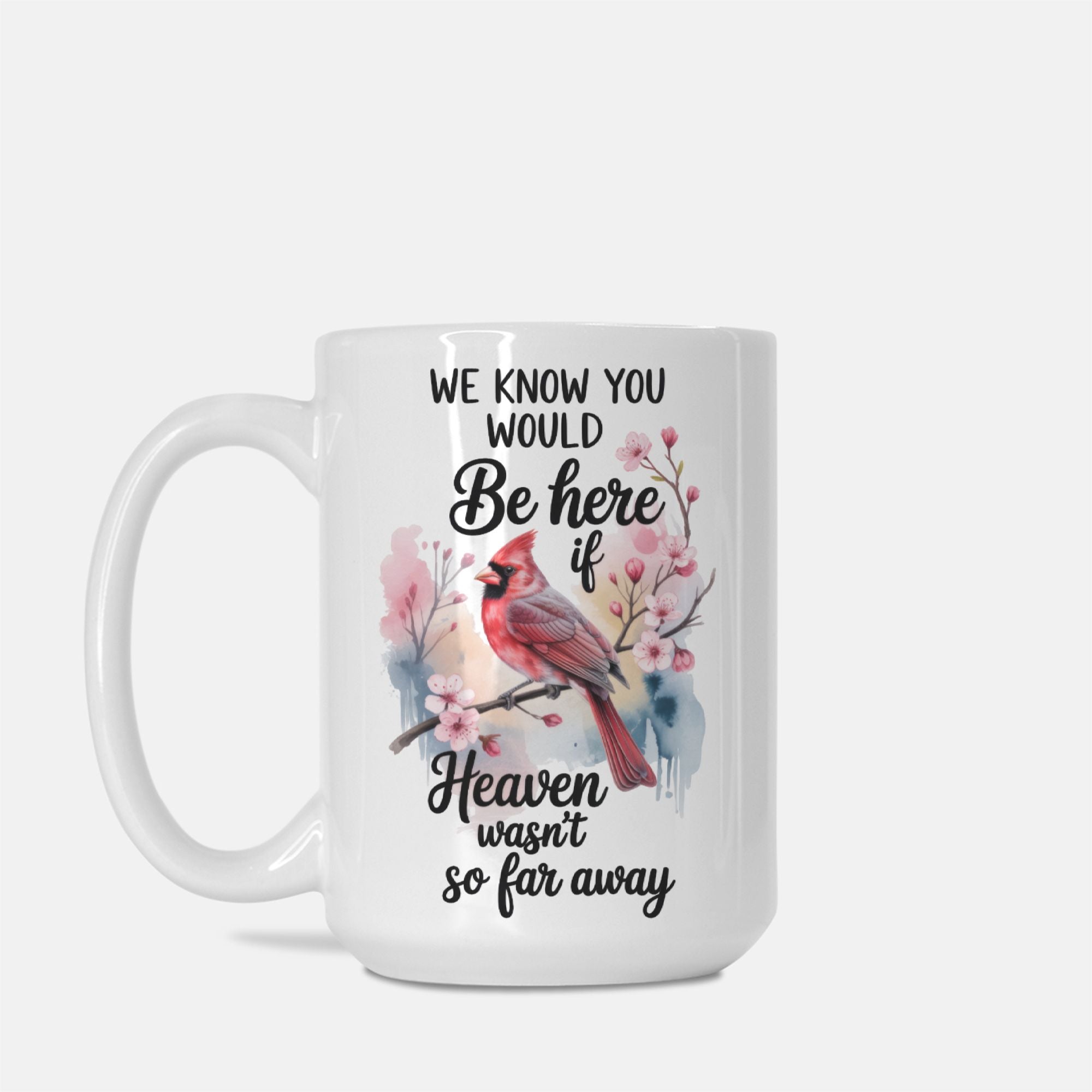 White mug with a cardinal bird design and text on a white background