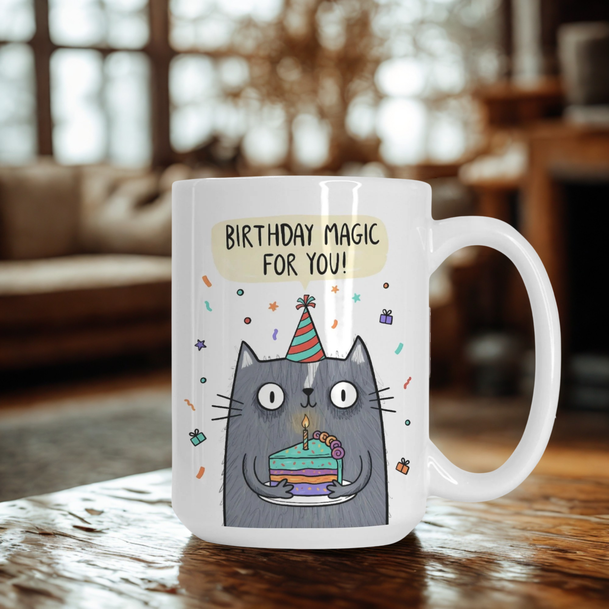 Mug with a cat illustration and 'Birthday Magic for You!' text on a wooden table.