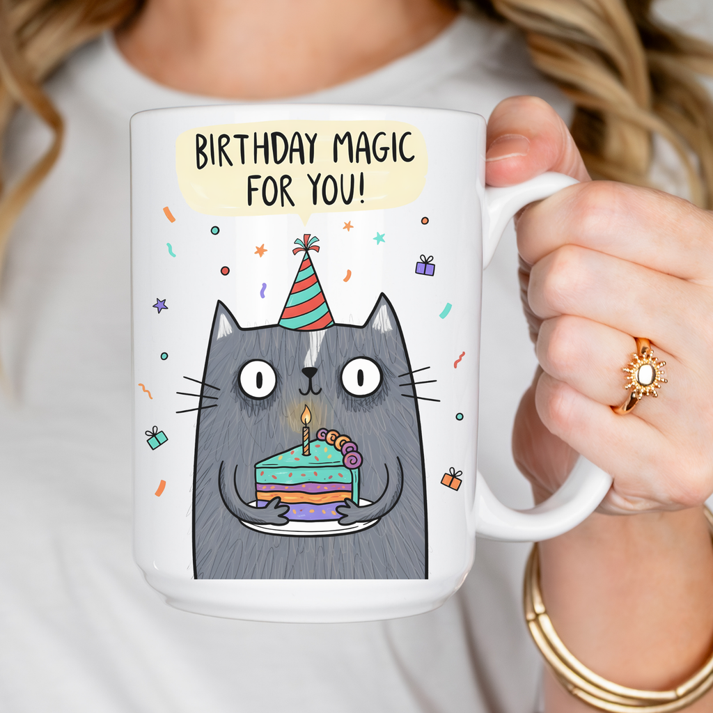 Mug with a cat holding a birthday cake and 'Birthday Magic For You!' text