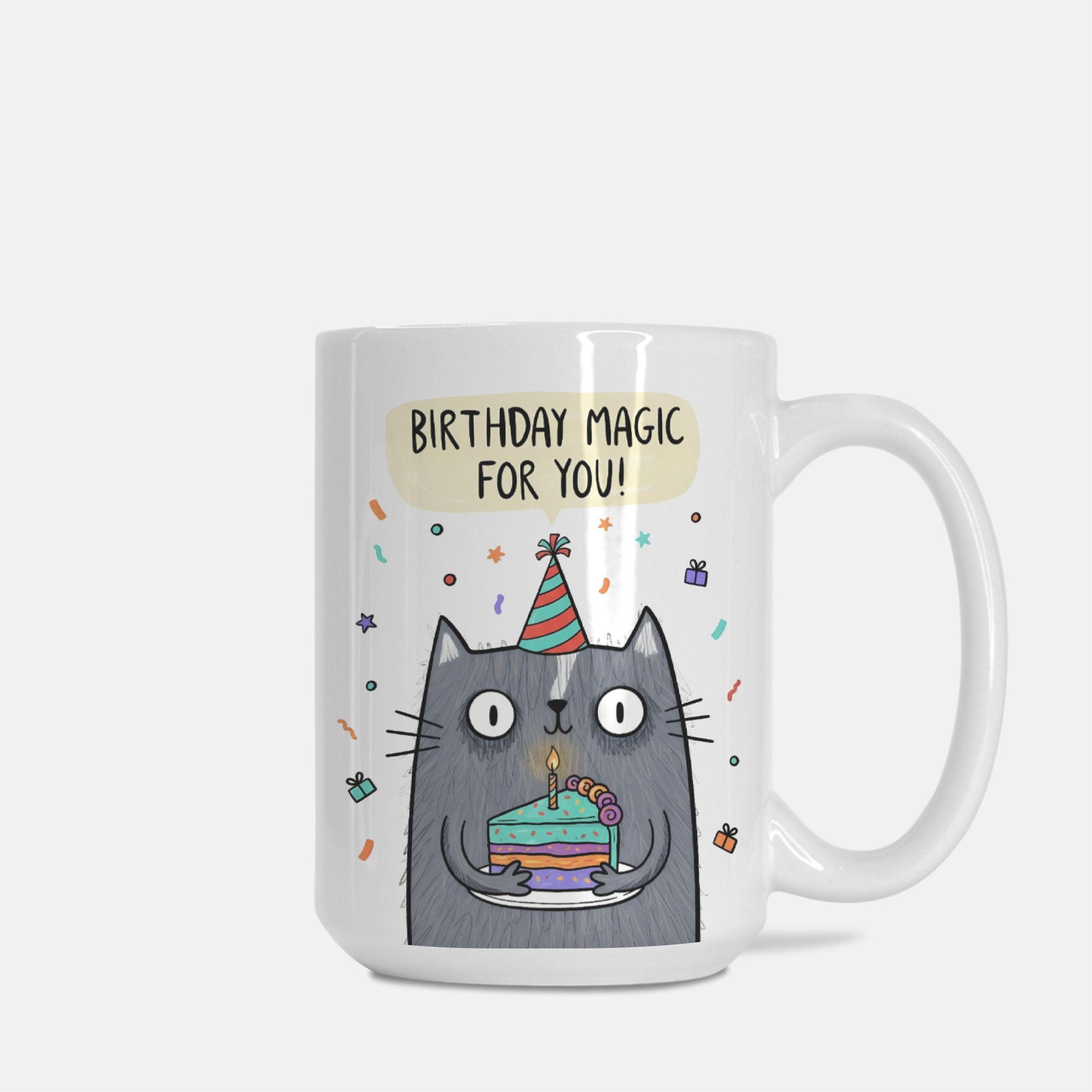 Mug with a cartoon cat holding a birthday cake and the text 'Birthday magic for you!' on a white background.