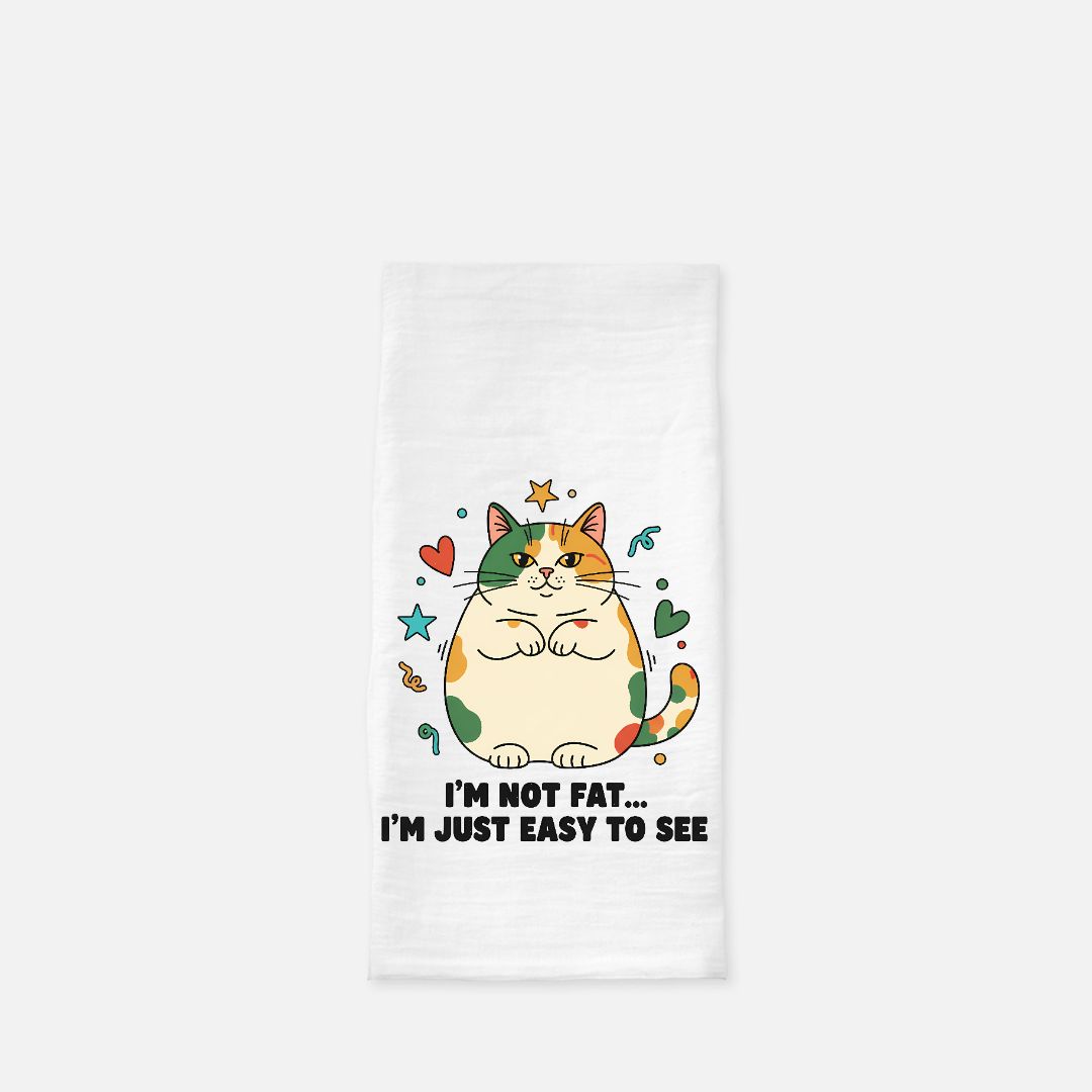 Tea towel with a cartoon cat design and text on a white background