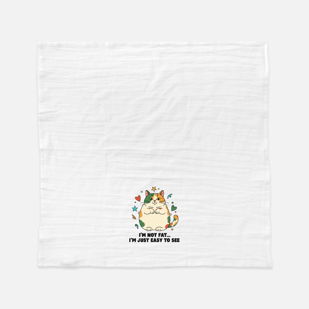 White t-shirt with a cartoon cat design and text on a white background