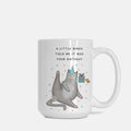 White mug with a cat wearing a party hat and text 'A little birdie told me it was your birthday' on a white background