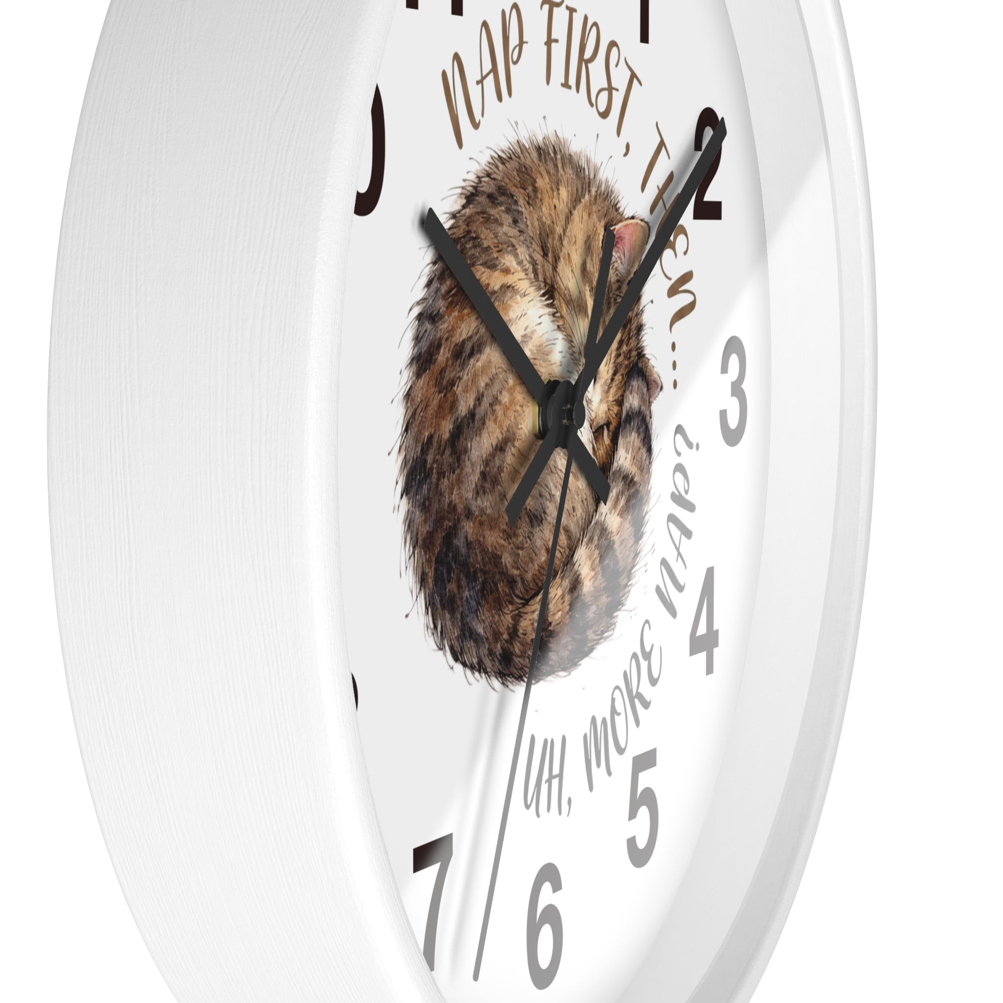 Side view of a round white wall clock with a cat design and humorous text on a white background