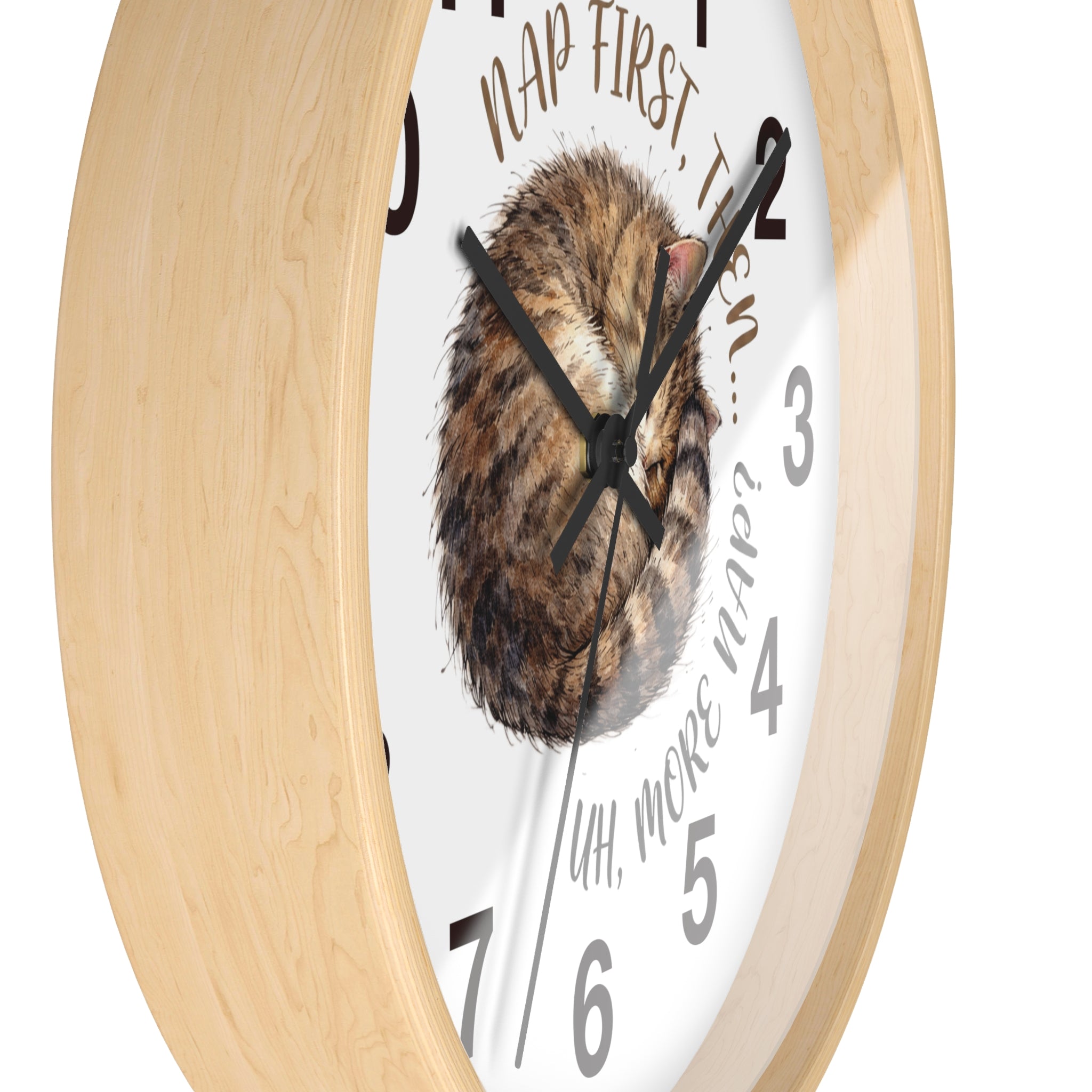 Side view of a round wood wall clock with a cat illustration and humorous text on a white background