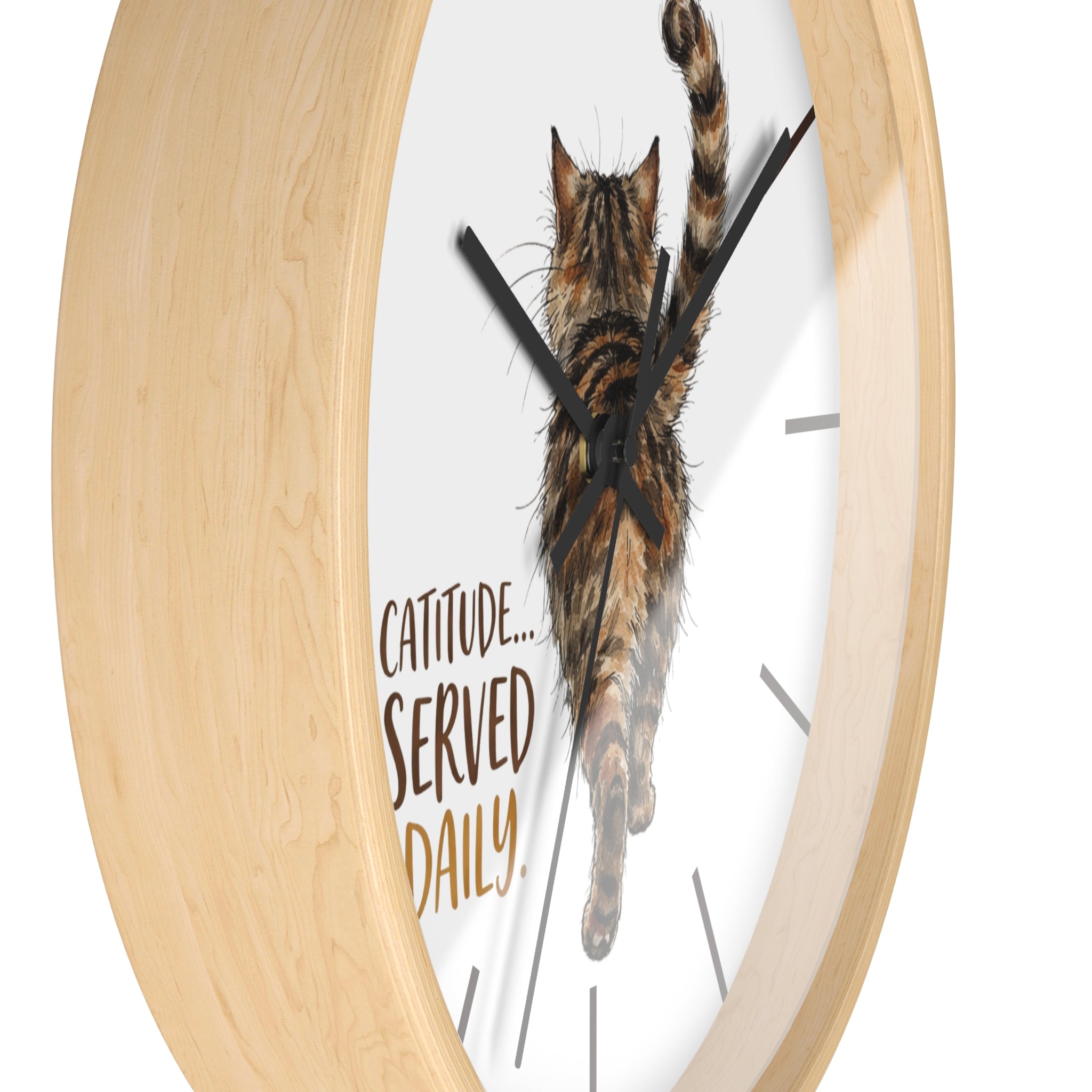 Side viw of a round wood wall clock with a cat design and text 'Catitude... Served Daily' on a white background