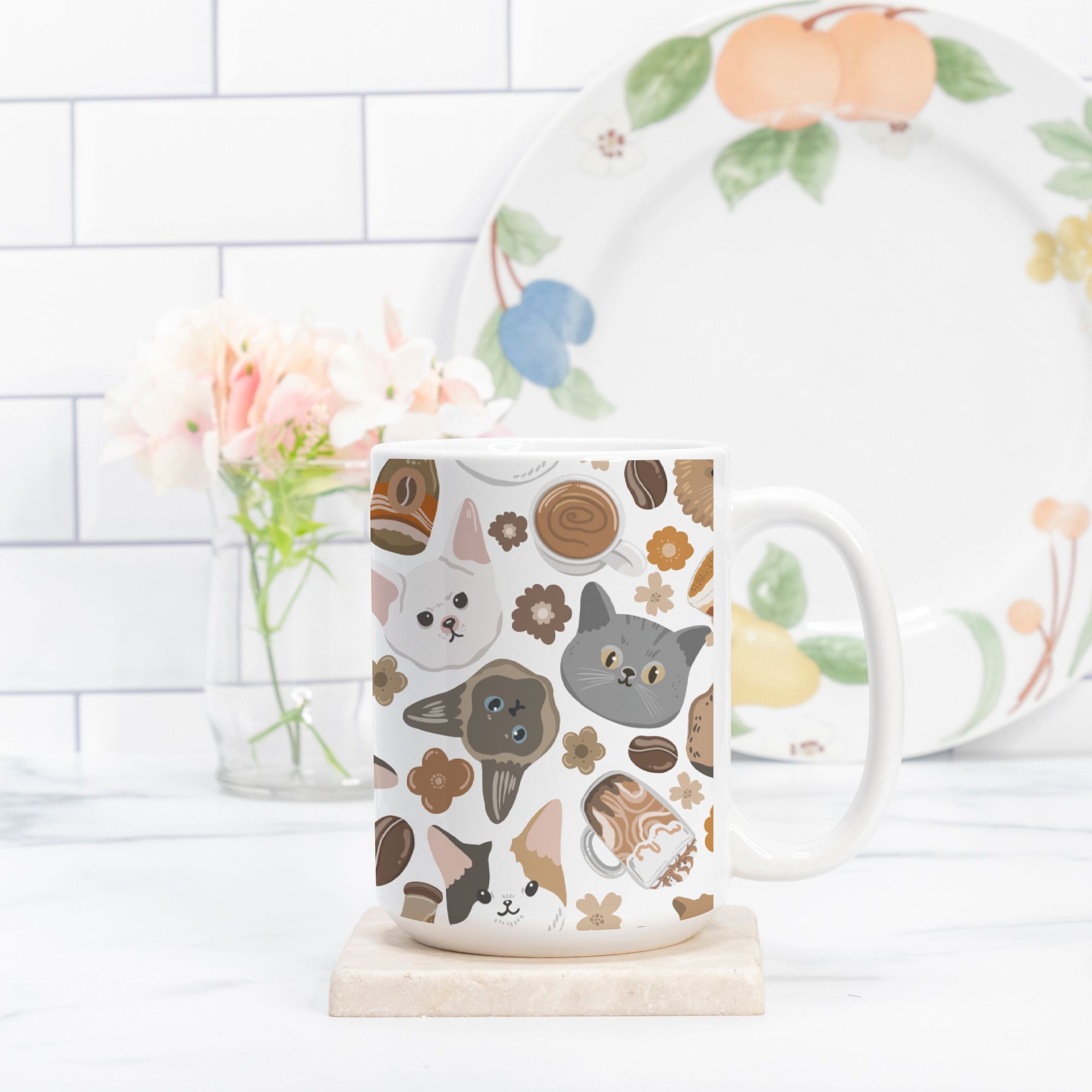 Mug with cat pattern on a white surface with a blurred background