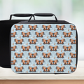 Black lunch bag with butterfly pattern on a light blue background