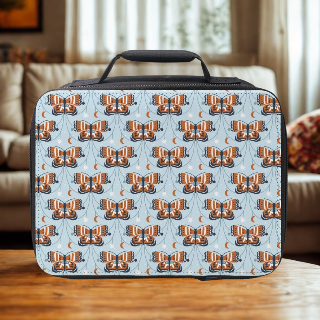 Lunch bag with butterfly pattern on a wooden table in a cozy living room.