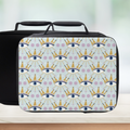 Insulated lunch bag with a celestial eye & crown pattern on a light blue background