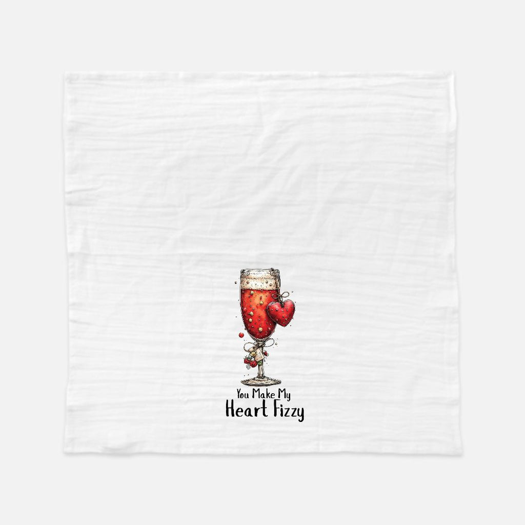Tea towel with Wine glass graphic with red liquid and heart shapes and text 'You Make My Heart Fizzy' on a white background
