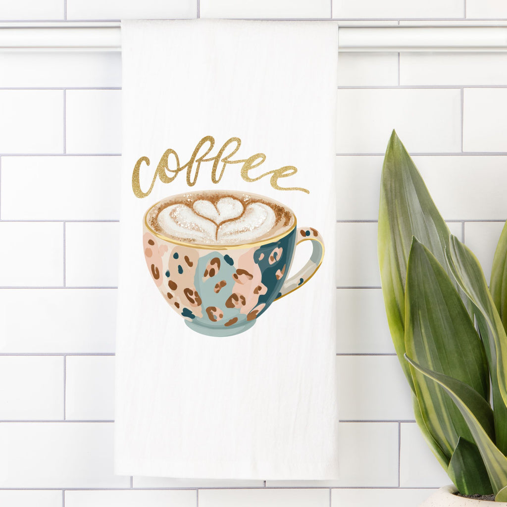 Decorative tile with a coffee-themed design featuring a cup and the word 'coffee' on a white tiled background.