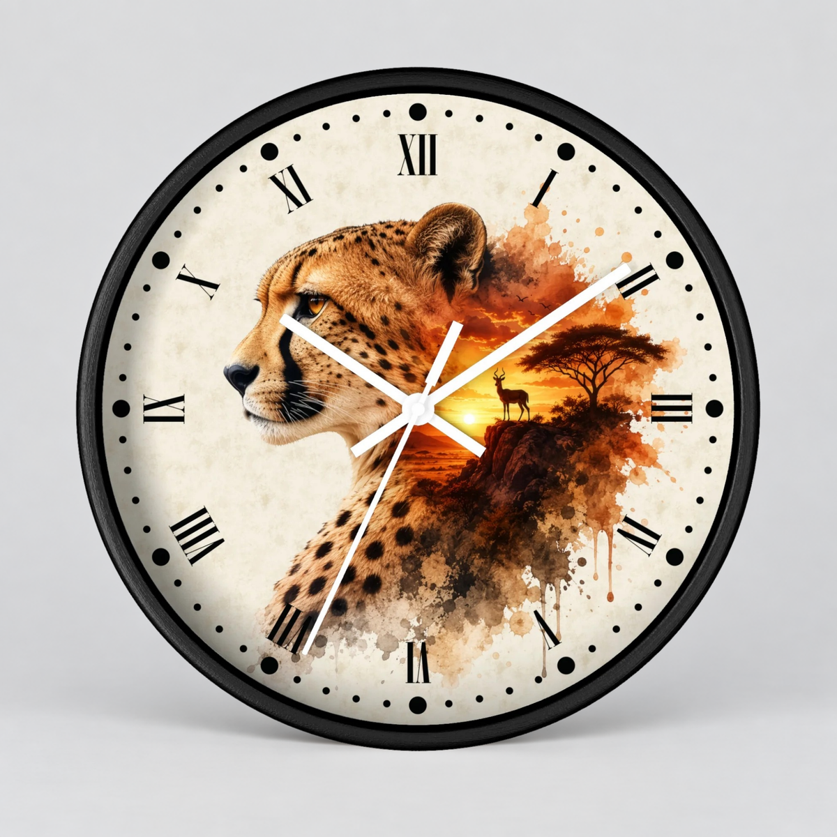 A round wall clock with a black frame and a printed dial featuring a cheetah profile blending into an African savanna sunset scene with a deer and tree. The clock uses black Roman numerals and white hands against an off-white textured background, shown on a light gray studio background.