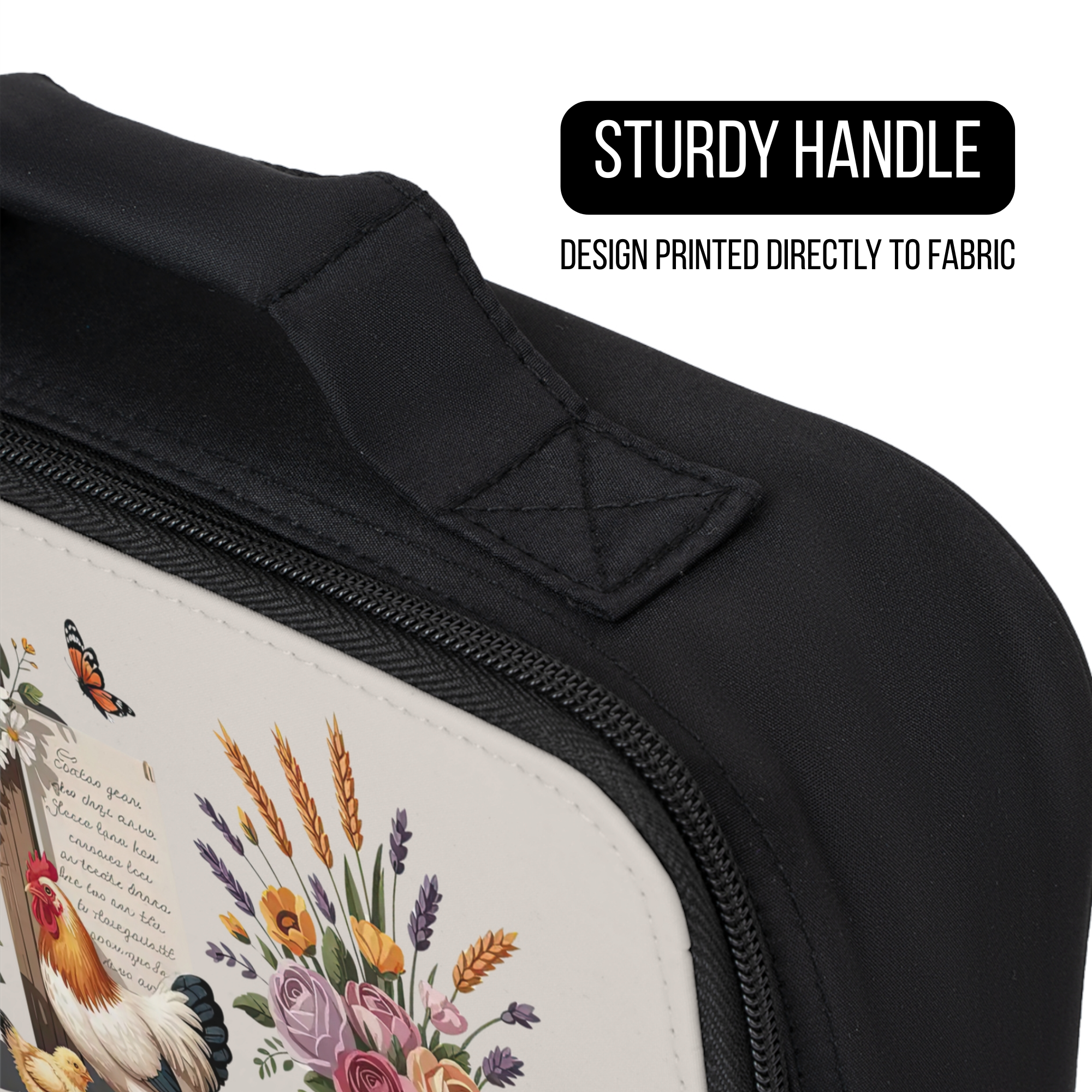Black lunch bag with a chicken floral design printed directly to the fabric and close up of the sturdy handle. 