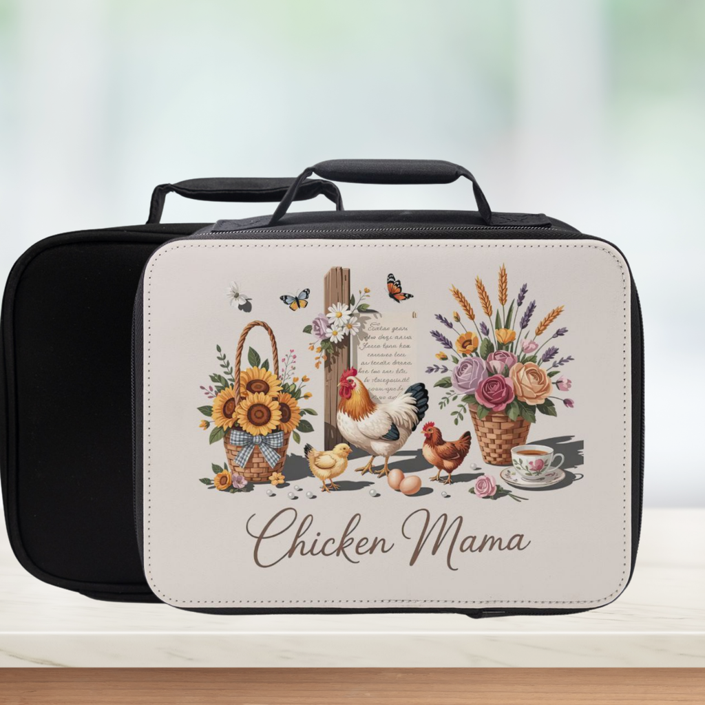 Lunch box with 'Chicken Mama' design featuring chickens, flowers, and a book on a white background.