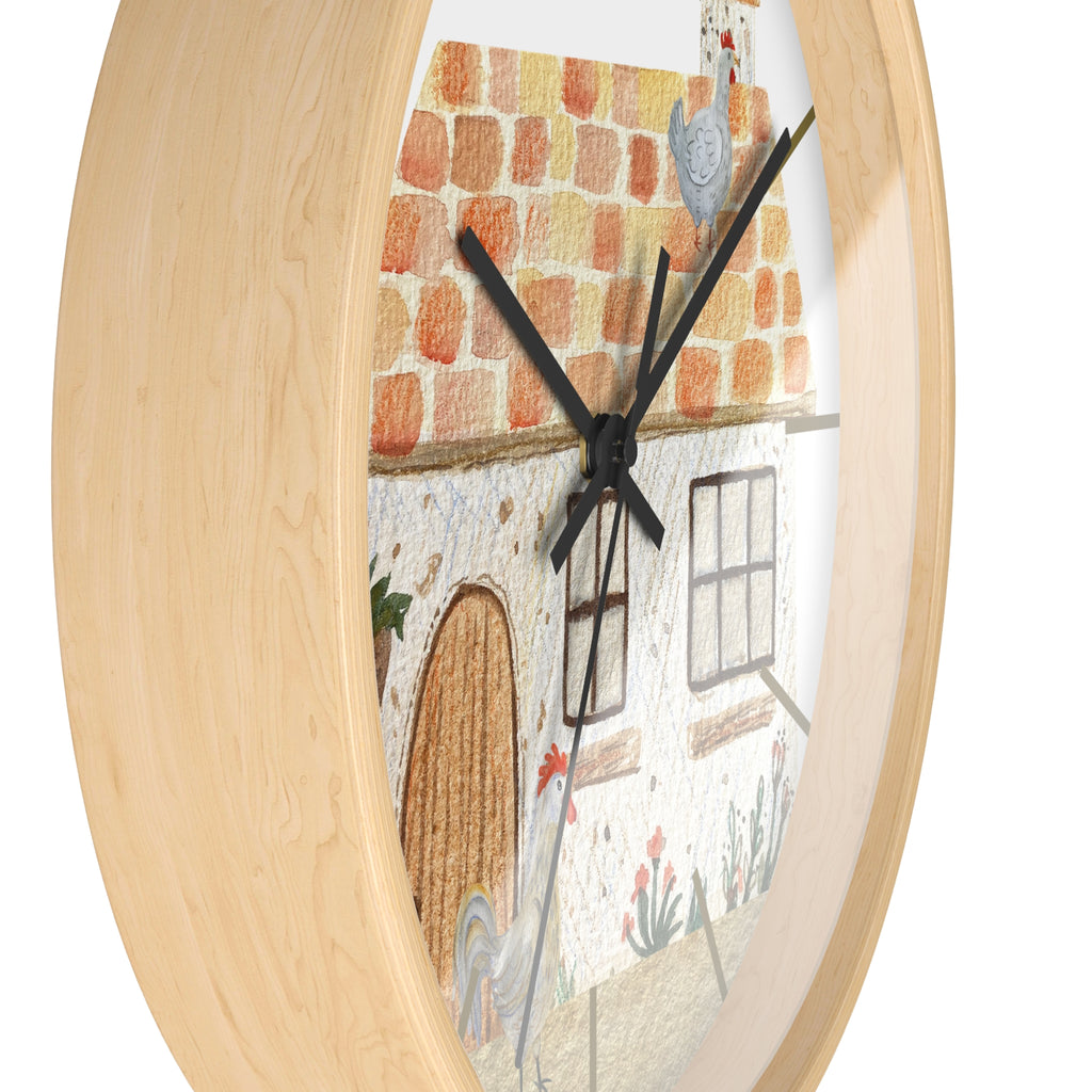Wall clock with a decorative design of a house and brick wall on a white background