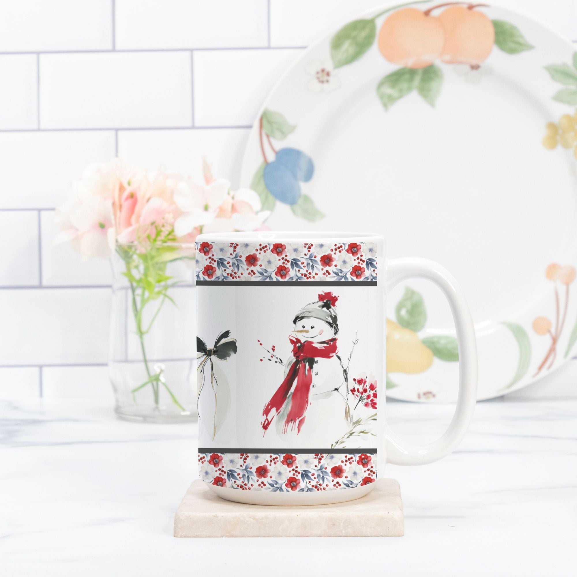 Mug with a snowman design and floral patterns on a white surface.