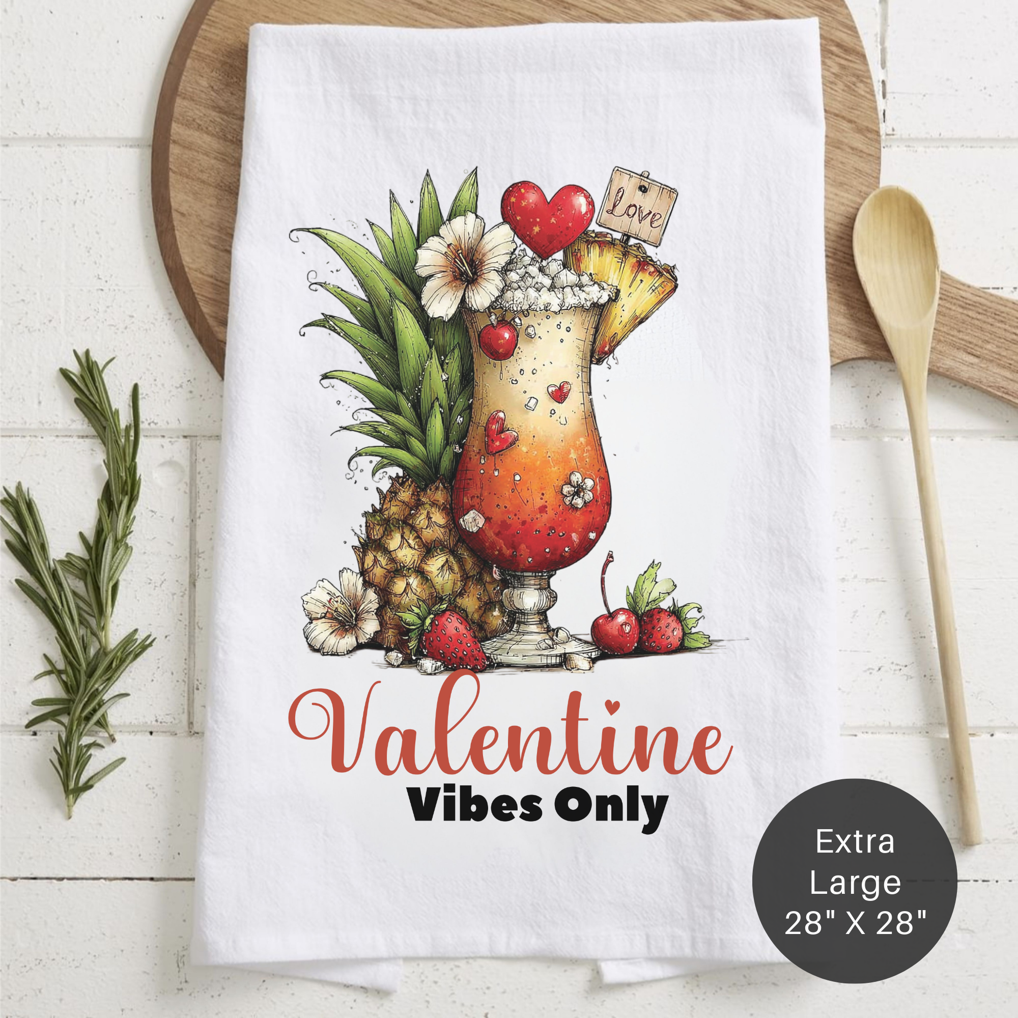 Valentine-themed towel with tropical drink design and 'Valentine Vibes Only' text on a wooden surface.