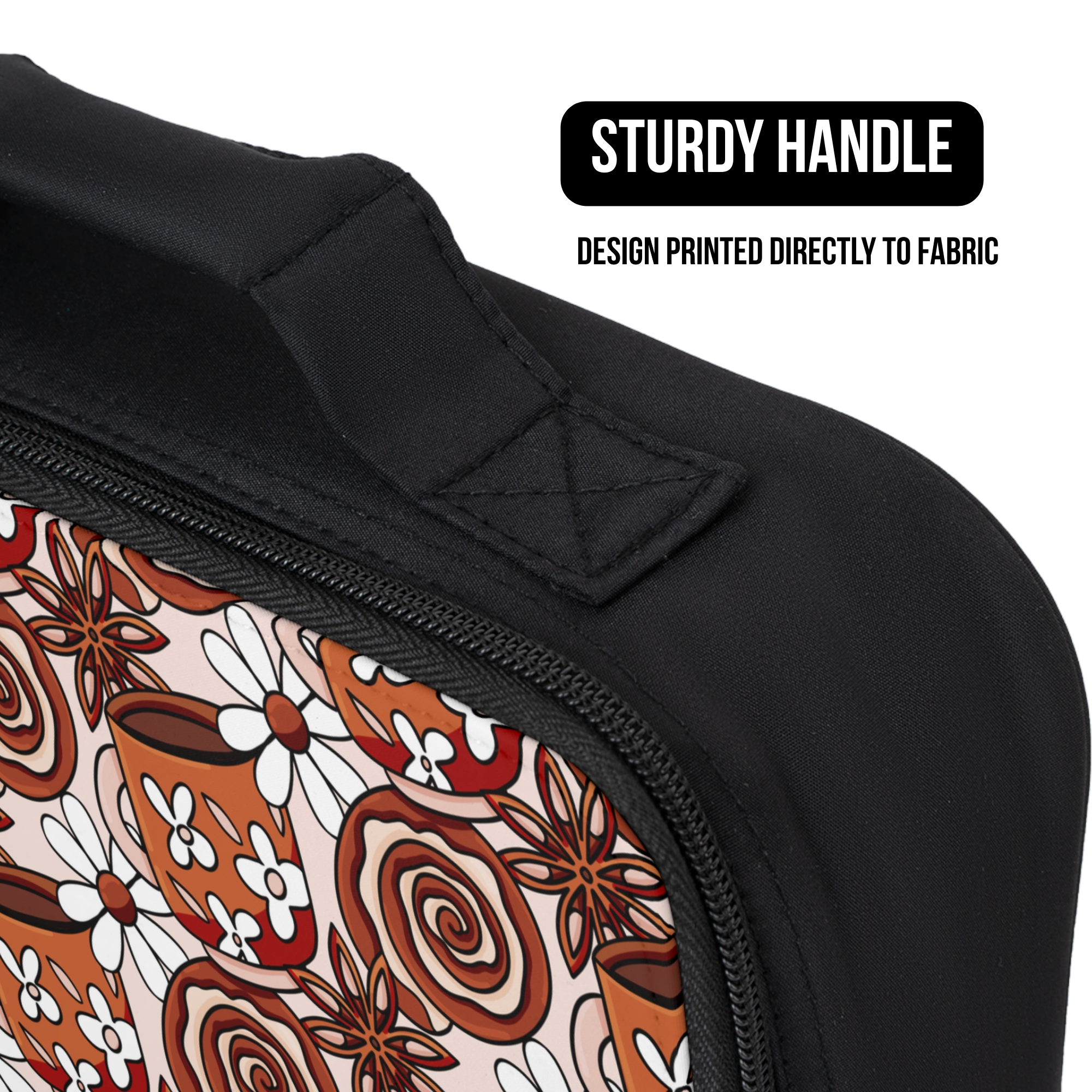 Black lunch bag with a coffee cup and flower patterned design and sturdy handle feature.