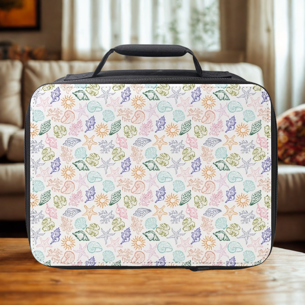  insulated lunch bag with a colorful sea shell pattern on a wooden table in a cozy living room.