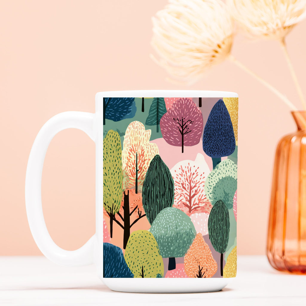 Mug with colorful forest design on a light pink background
