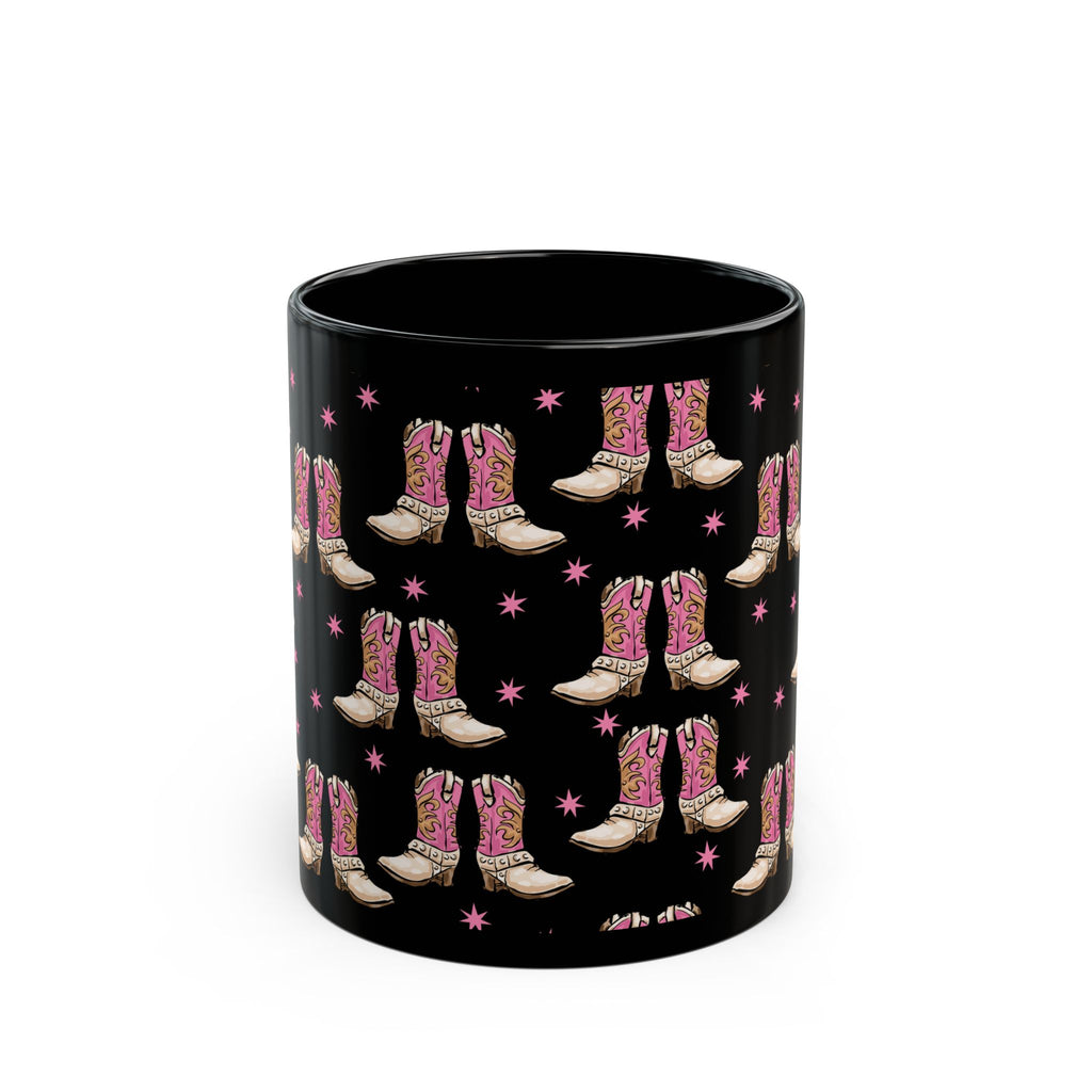 Front of 11 oz. Black mug with pink cowboy boot pattern on a white background