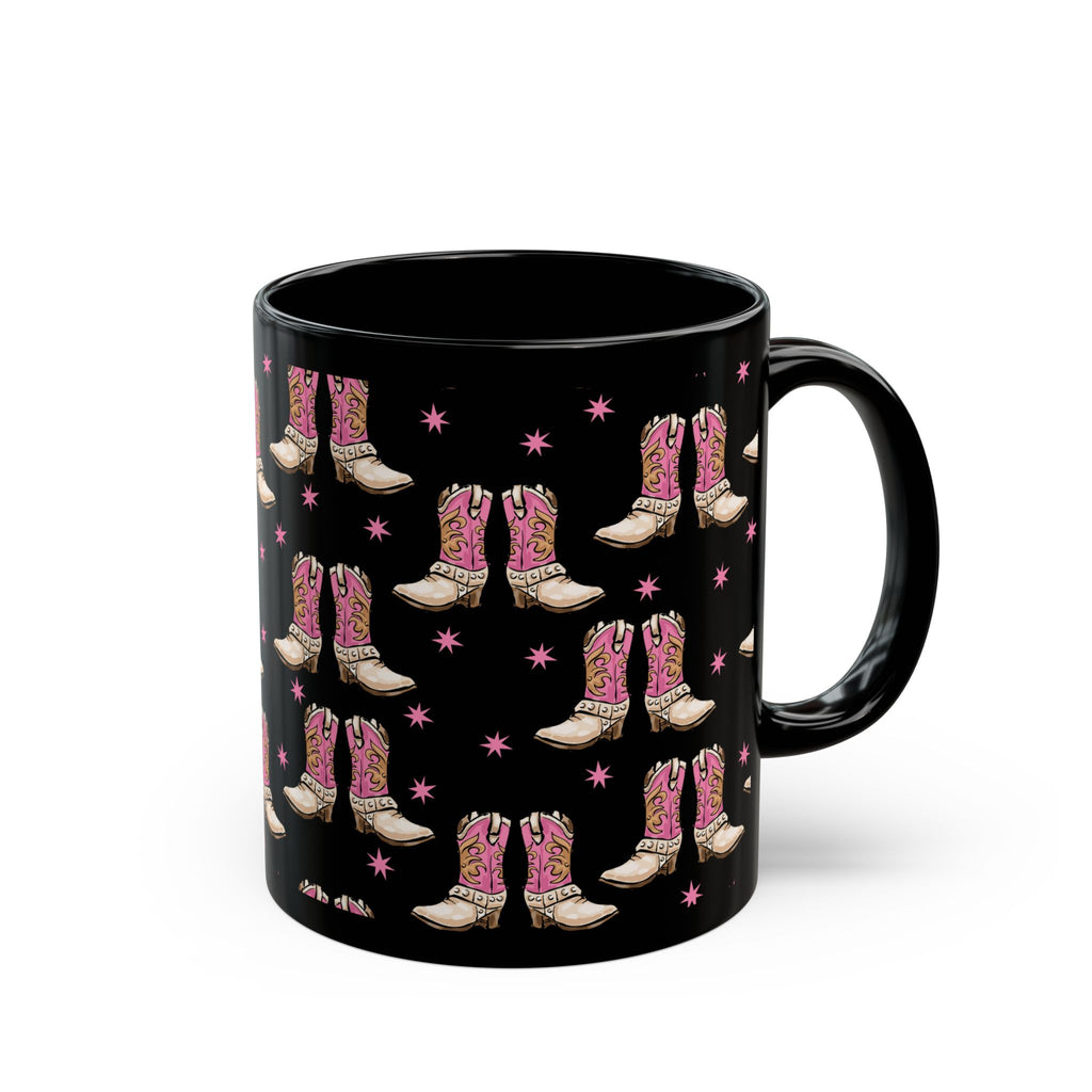 Right side of 11oz. Black mug with pink cowboy boot pattern on a white background