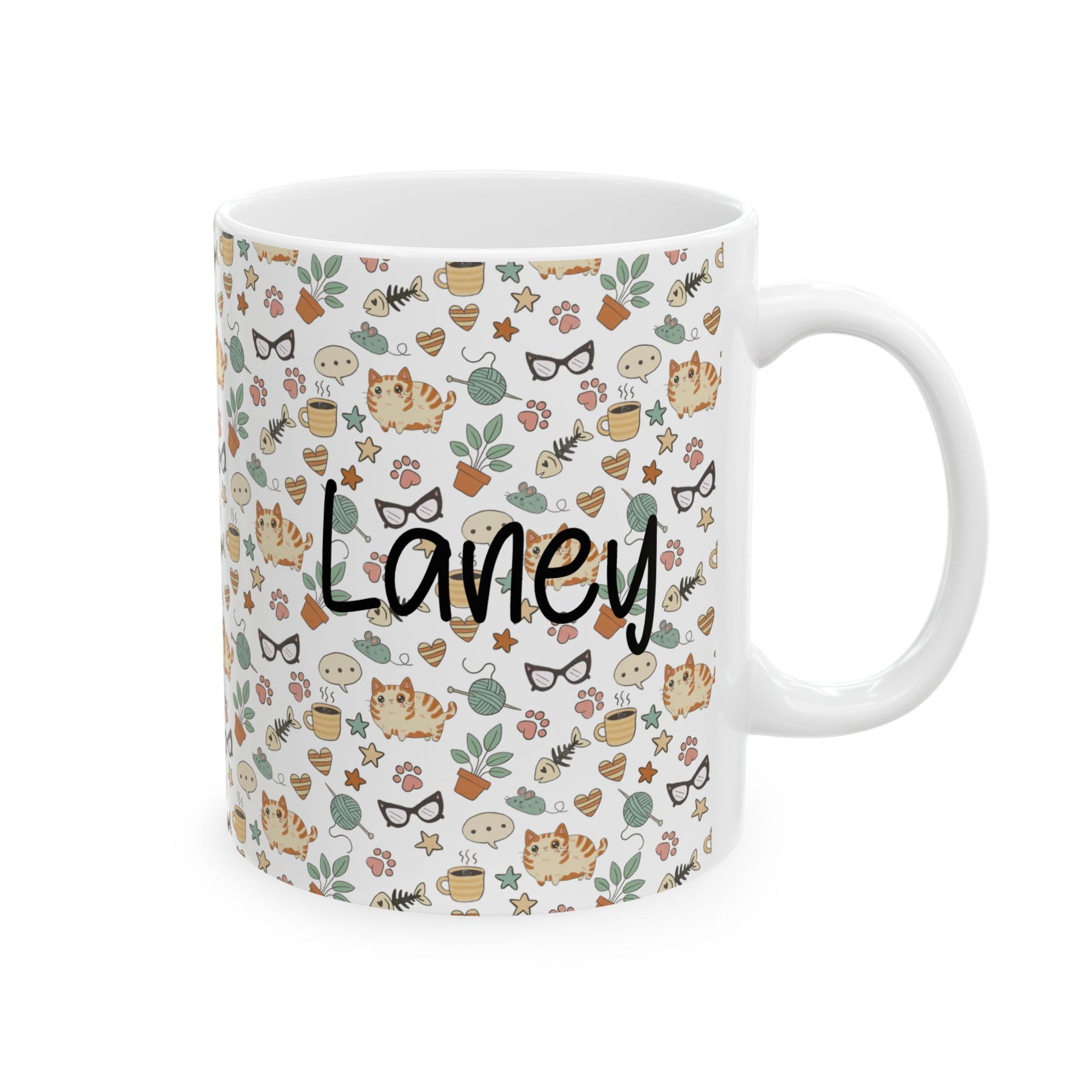 Mug with a pattern of cats, flowers, and the name 'Laney' on a white background