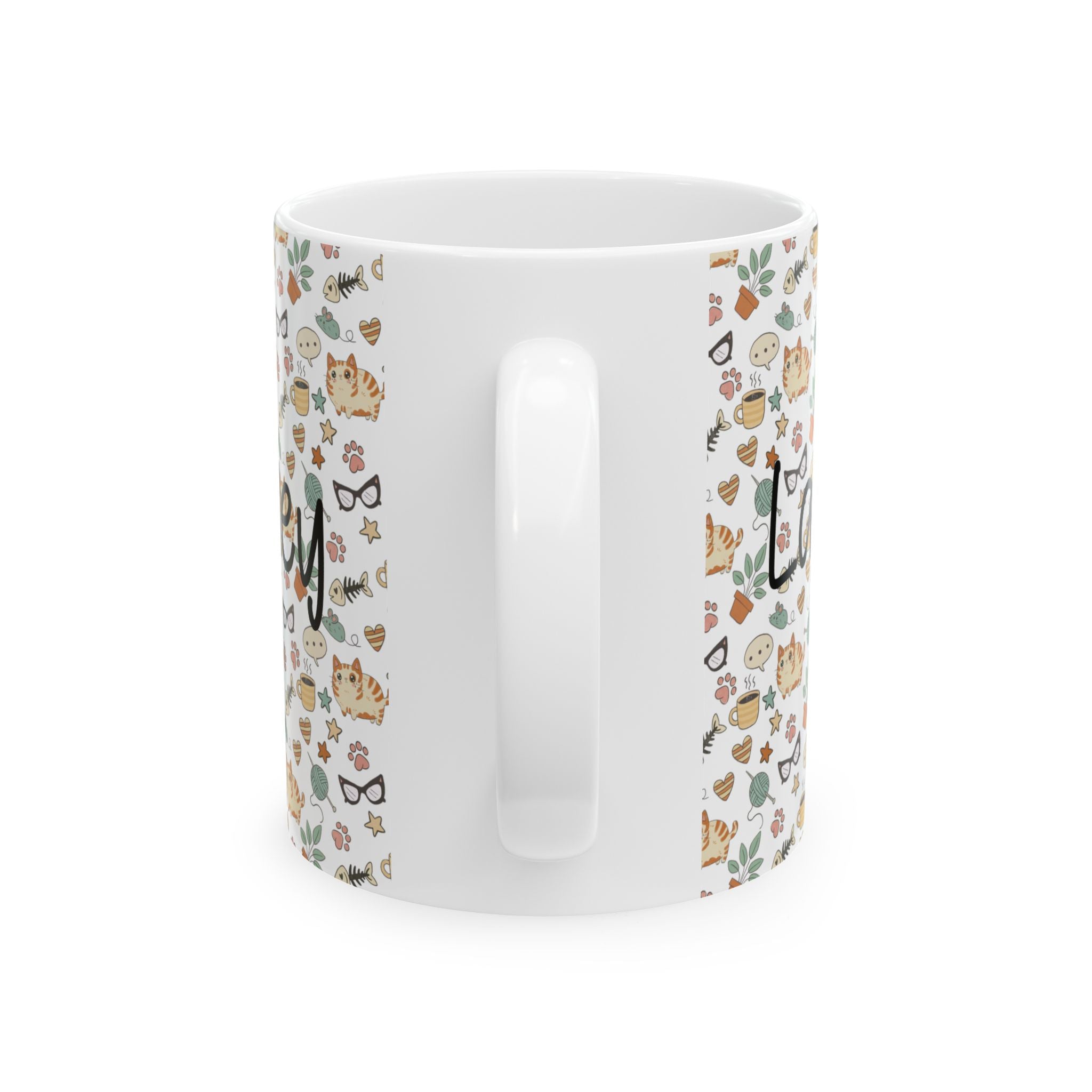 Back side of a white mug with cat-themed pattern on a white background