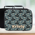 Patterned lunch bag with 'Kristy' personalized name on a blurred background