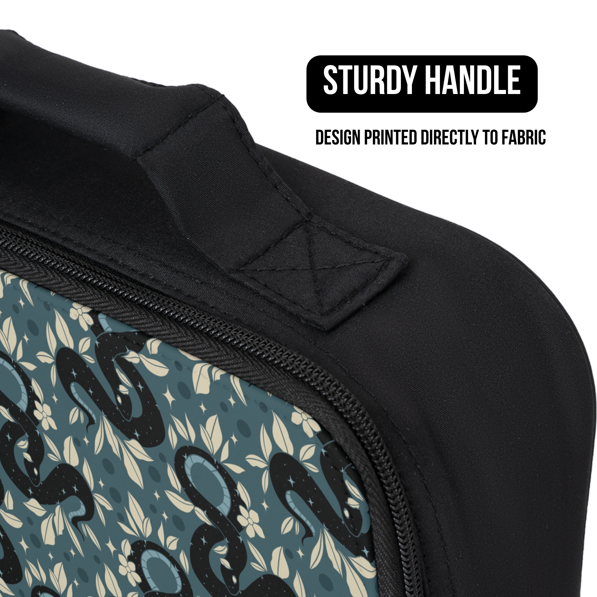 Black bag with floral snake pattern and sturdy handle design printed directly to fabric