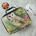 Lunch bag with owl design and 'AMANDA' personalized text on a cafeteria table with a drink and utensils.