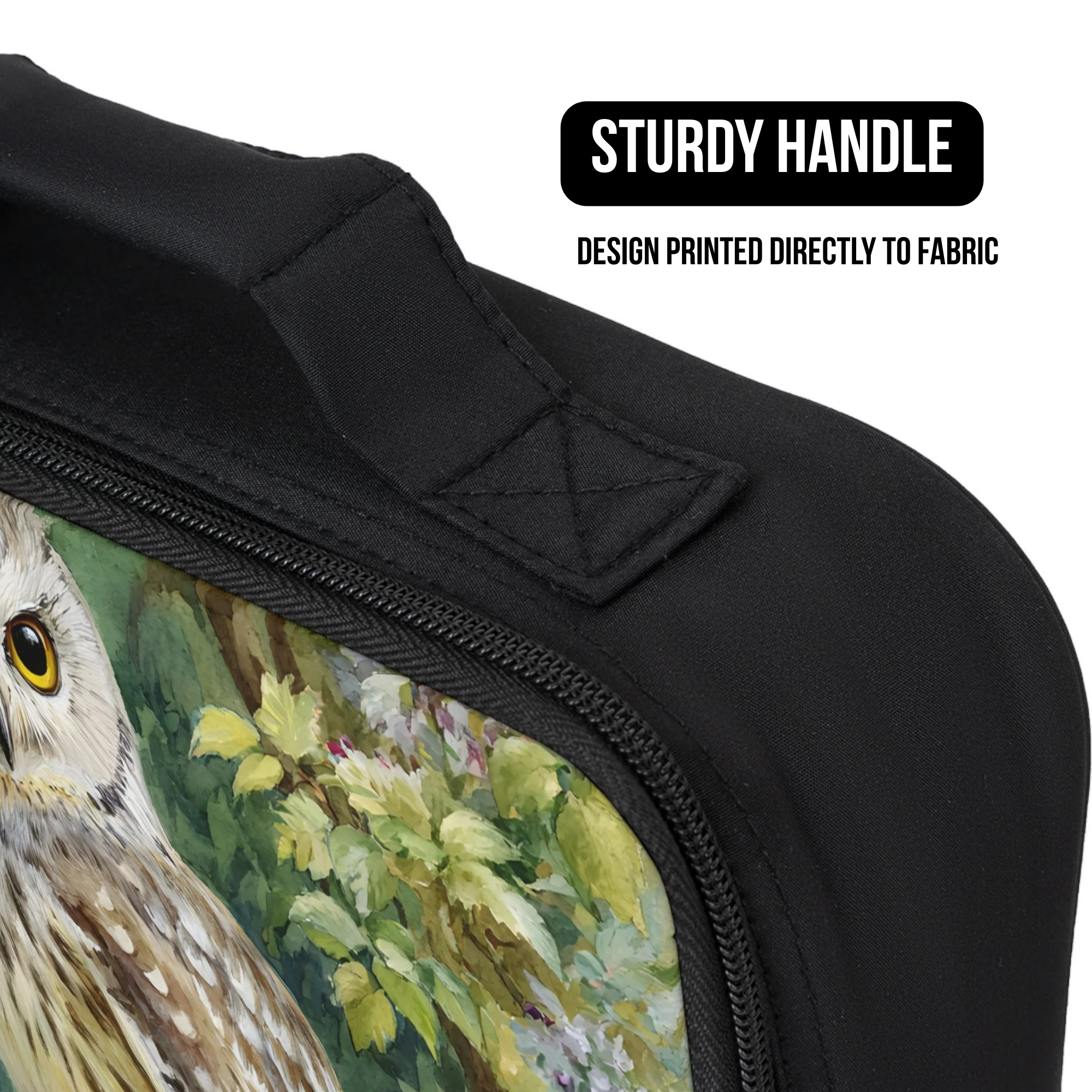 Black bag with owl design and sturdy handle feature