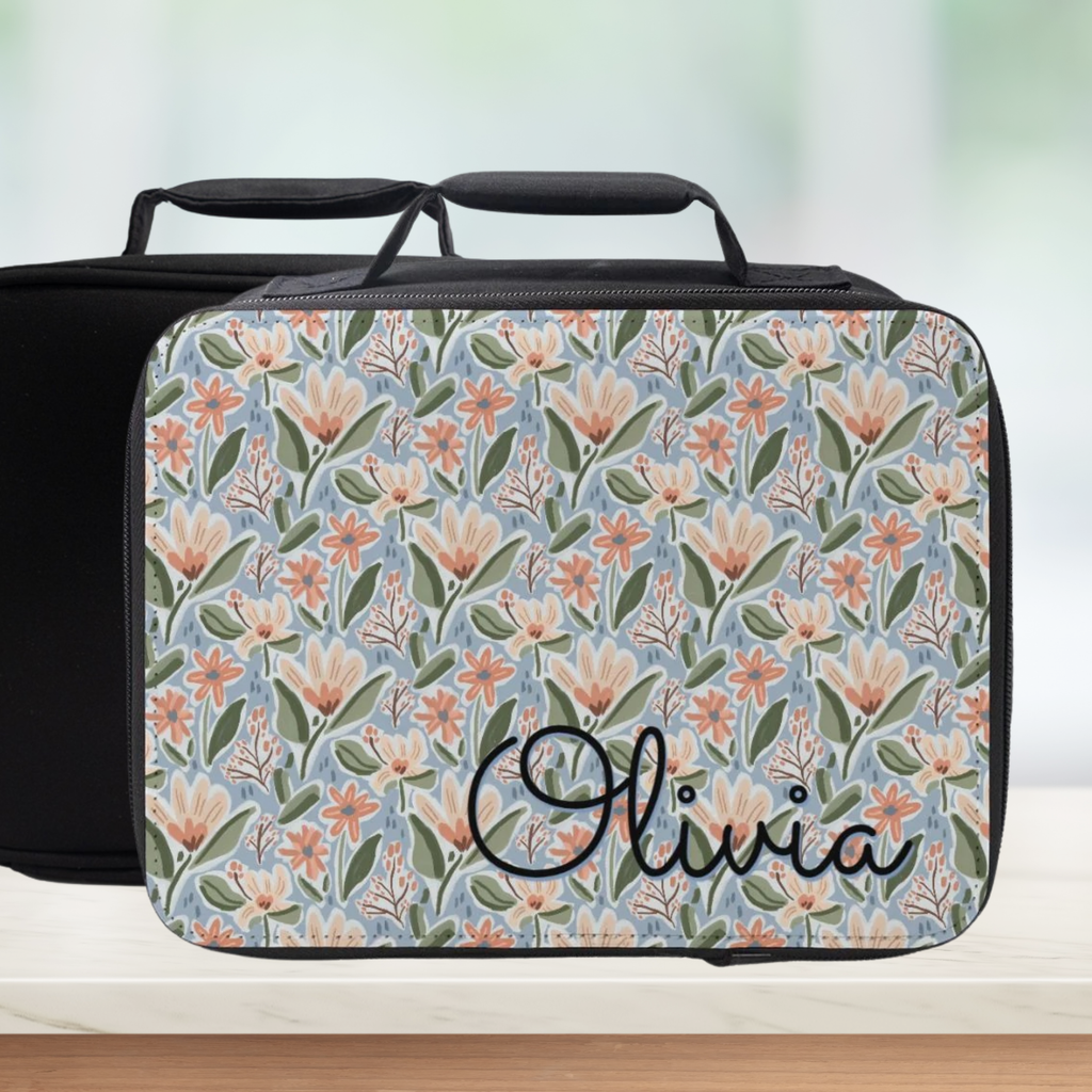 Floral-patterned lunch bag with 'Olivia' personalized name on a light background
