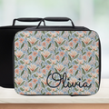 Floral-patterned lunch bag with 'Olivia' personalized name on a light background