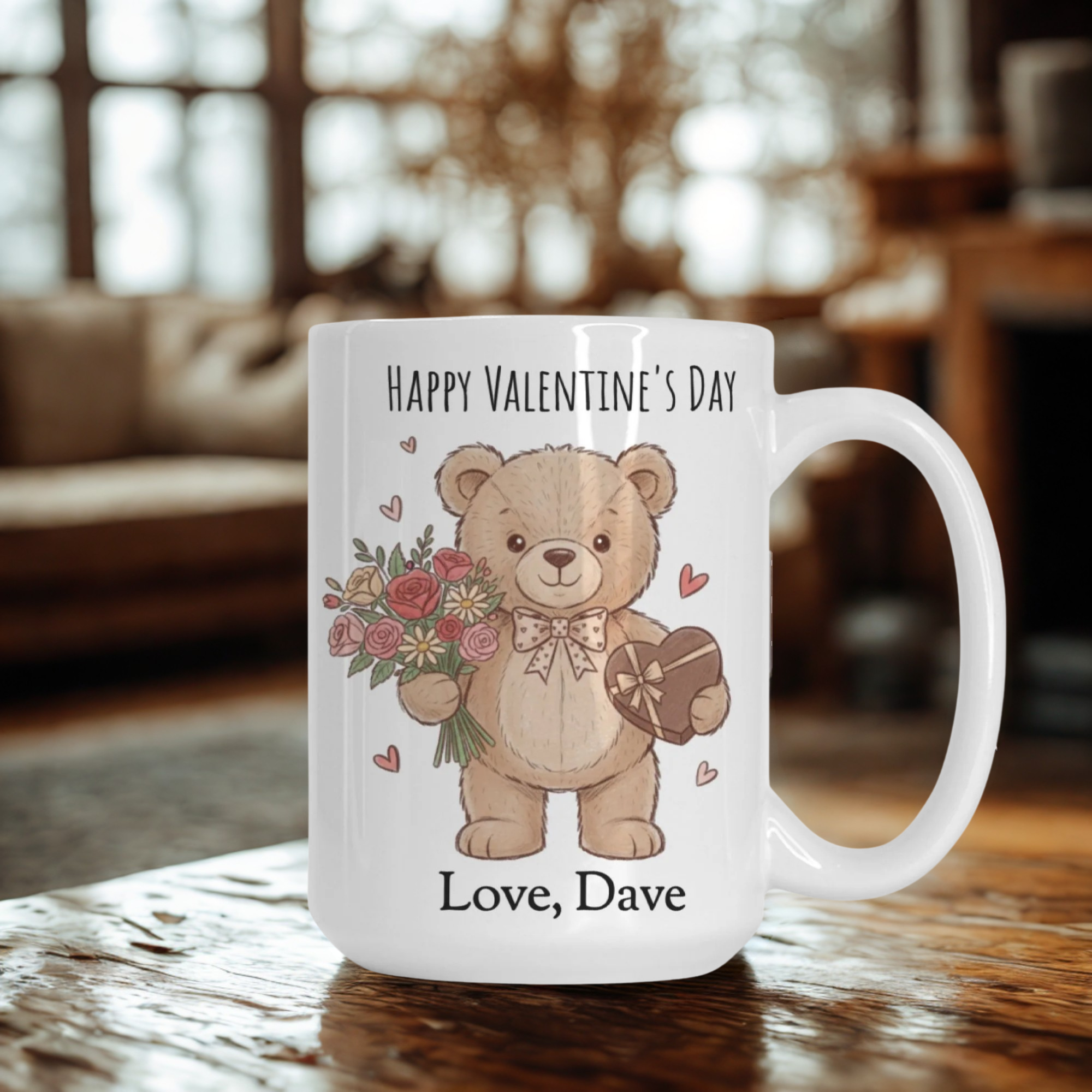 Valentine's Day mug with a teddy bear design and personalized text on a wooden table.