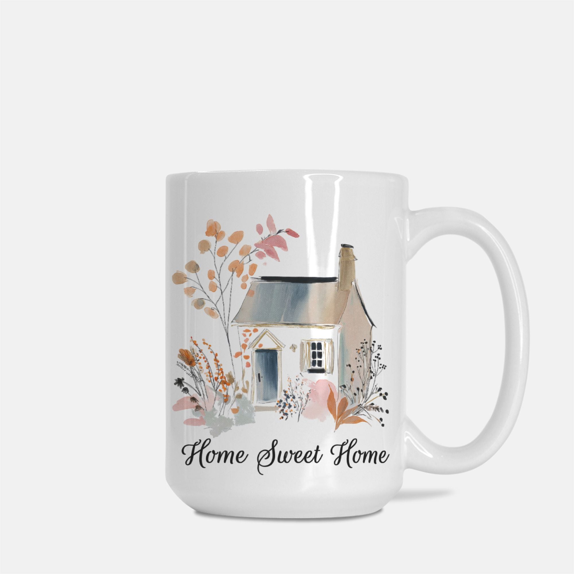 White mug with a house illustration and 'Home Sweet Home' text on a white background