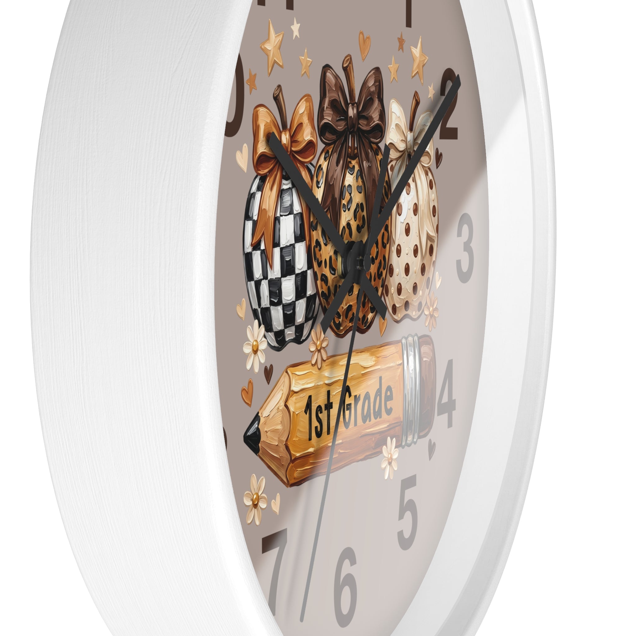 Decorative clock with checkered, leopard print, and polka dot bows, and a '1st Grade' book on a gray background.