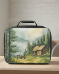  insulated lunch bag with a scenic design of a cabin and trees, featuring the name 'Bob'.