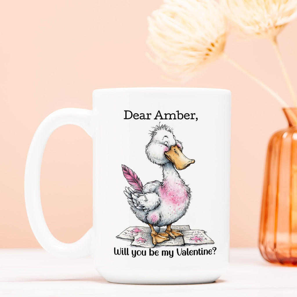 Mug with a cartoon duck holding a heart-shaped card on a peach background