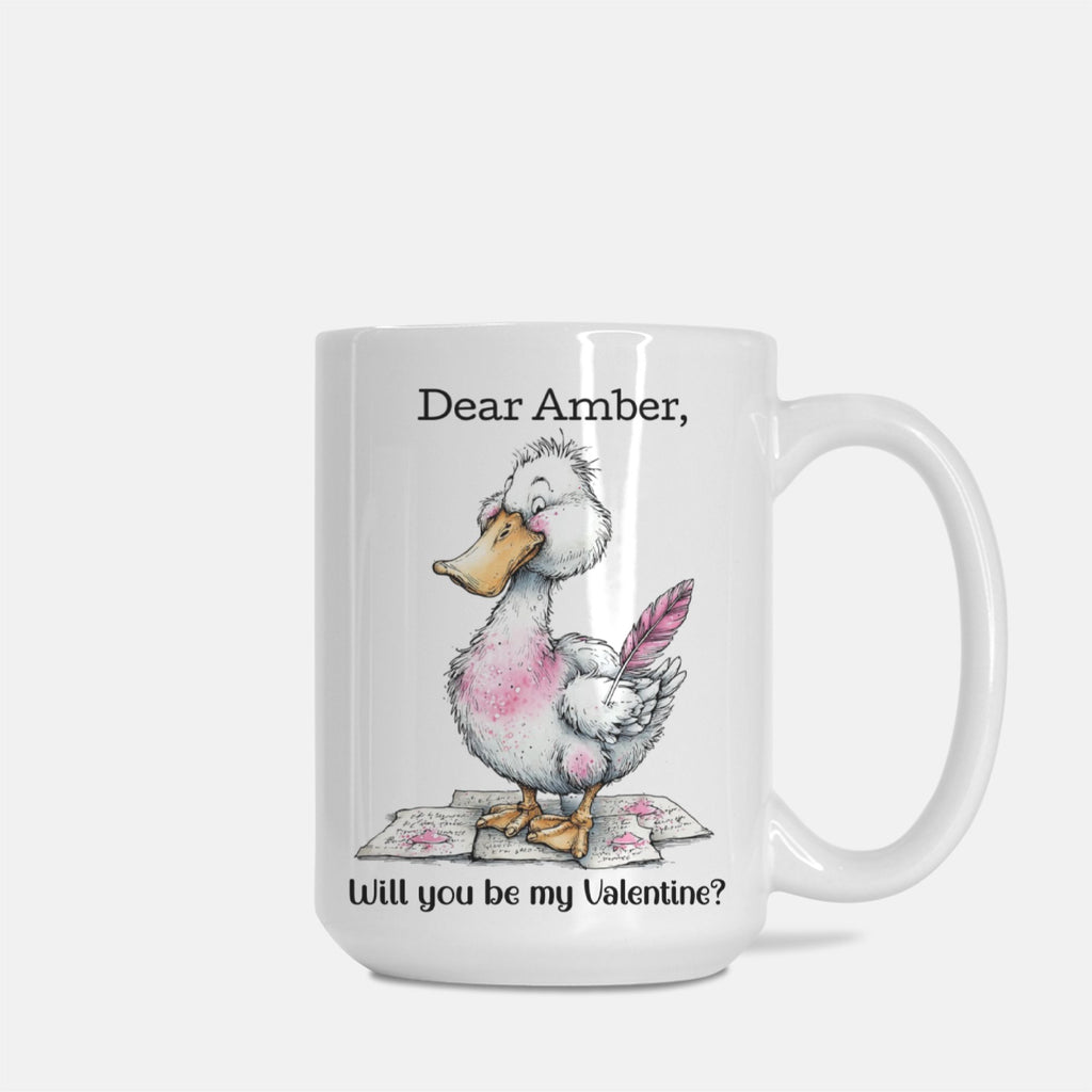 Mug with a cartoon goose holding a heart and text ' Dear Amber, Will you be my Valentine?' on a white background