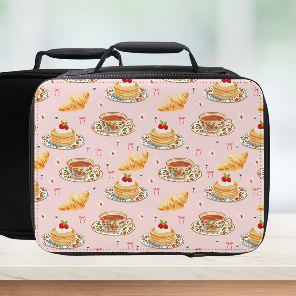 Lunch bag with pastry and tea pattern on a light background