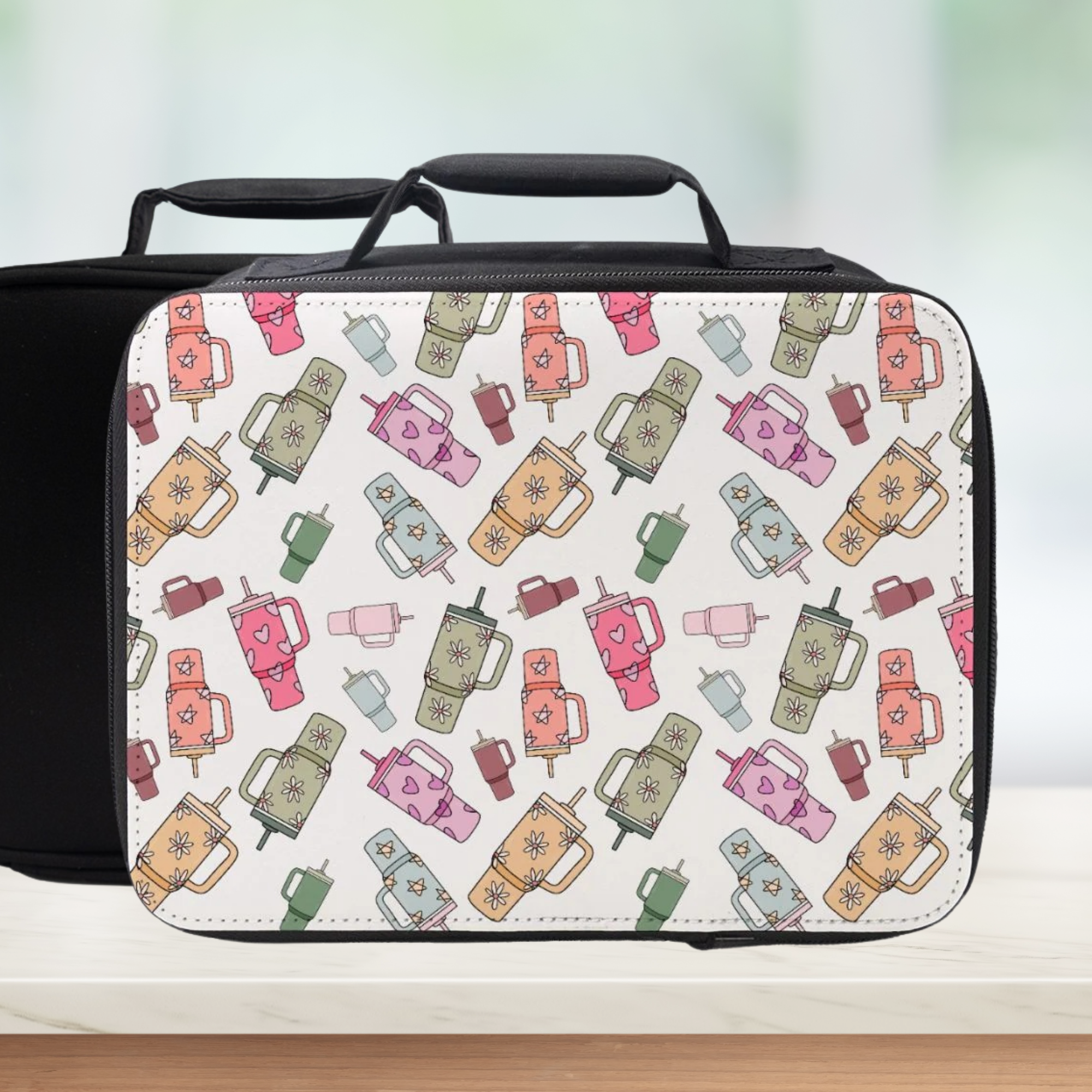 Lunch bag with a colorful pattern of trendy cups on a white background.