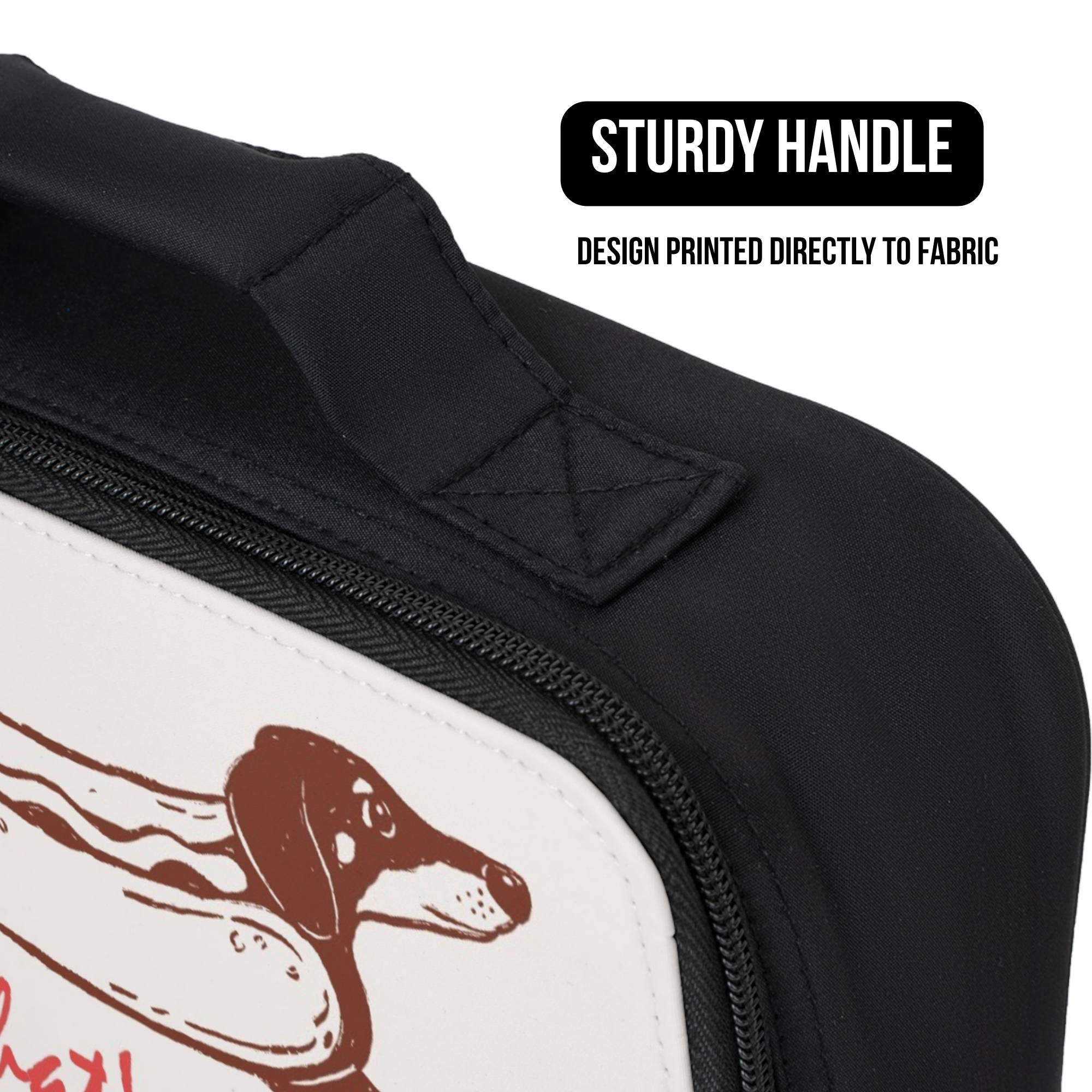 Black lunch  bag with a dachshund design and text about a sturdy handle and printed fabric.